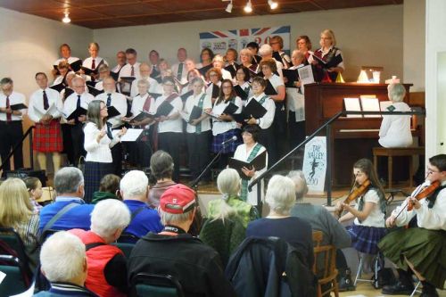 Rebecca Worden leads the Tay Valley Community Choir at their 200 year Anniversary celebration concert in Maberly on April 16